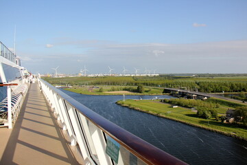 On the upper deck of a large ocean liner.