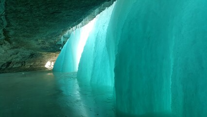 Stunning view of an icy cave with Frozen Minnehaha falls