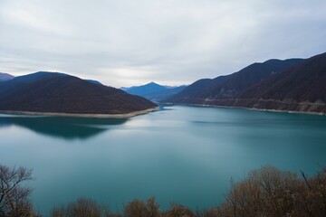 Scenic view of Zhinvalskoe Reservoir, Georgia on a cloudy day
