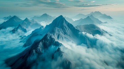 An aerial perspective of a mountain range enveloped in a thick layer of clouds, - obrazy, fototapety, plakaty