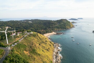 Fototapeta premium Aerial view of Nai Harn Beach in Phuket, surrounded by lush tropical vegetation