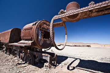 old steam locomotive In the train cemetery, the site of ancient trains, where the city of Uyuni was located on the inland railway line between Bolivia and Chile
