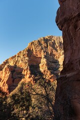 Scenic view of the red rock formations against blue sky in Sedona, Arizona