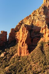 Scenic view of the red rock formations against blue sky in Sedona, Arizona