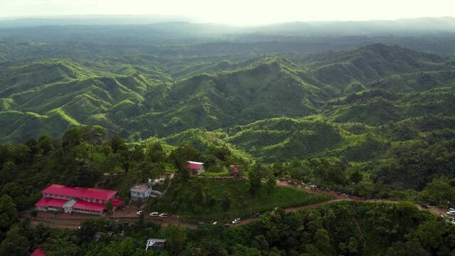 Aerial of the beautiful green hills of the Sajek Valley in Bangladesh during the daytime