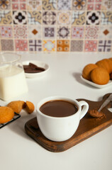 Fototapeta na wymiar Hot chocolate with chocolate pieces and cookies.