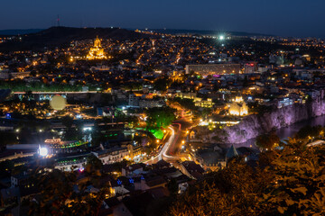 Panoramic view of Tbilisi city from Narikala fortress after the sunset - 772298481