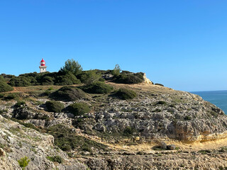 Lighthouse on Coastline in Algarve Portugal