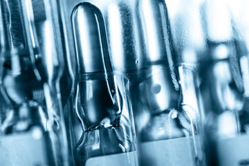 Ampoules with a transparent drug in the laboratory