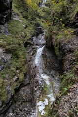Idyllic river cascading down into a rocky ravine, Berge, Pintauer Saalachtal