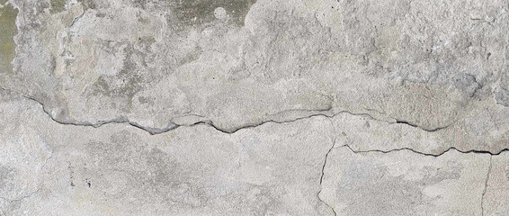 Crack wall texture. Cracked concrete wall covered with cement surface as background. Wall fragment...