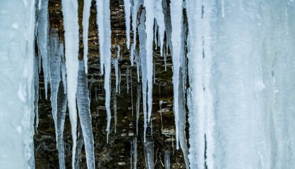 Frozen waterfall with icicles - obrazy, fototapety, plakaty
