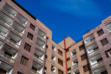 apartment building, blue sky, spring in town