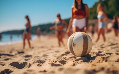 Friends playing beach volleyball under the bright summer sun.