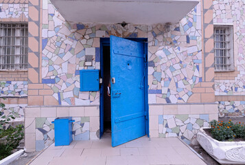 Entrance, door and sign of a prison school for juvenile offenders of Lukyanovskaya detention...