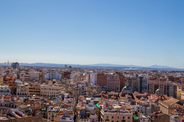 Obraz premium View of the old town of Valencia from the roof of Roman Catholic church in Plaza de la Reina