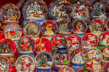 Fototapeta na wymiar Market stall with traditional Christmas decorations exposed on sale