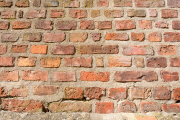 The red bricks wall. Old, medieval wall in Gniezno, Poland 