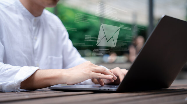 Businessman in casual look using laptop and working in startup business at cafe coffees shop in public locations ,work from home and anywhere meeting online, searching internet for job in social media