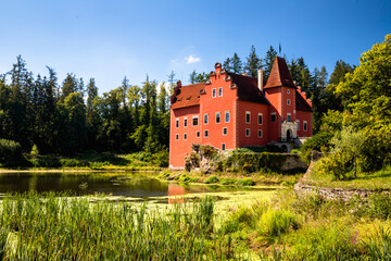 The Cervena (Red) Lhota Chateau is a beautiful and unique example of Renaissance architecture. It is located in the South Bohemian Region of the Czech Republic, surrounded by a picturesque lake.