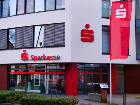 Exterior view with flag, name and symbol of the Sparkasse Paderborn - H&ouml;xter - Detmold in Paderborn - Elsen, the financial group of the German savings banks, Germany, Paderborn, 31. March 2024