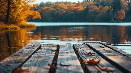Autumn background close up of old empty wooden table over the lake