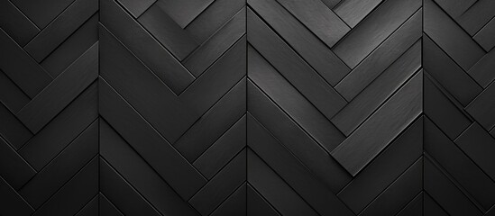 Fototapeta premium A close up of a dark grey herringbone pattern on a wall