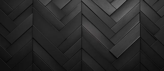 Foto op Aluminium A close up of a dark grey herringbone pattern on a wall © AkuAku