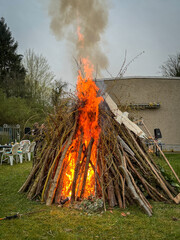 An Easter fire burns in the meadow