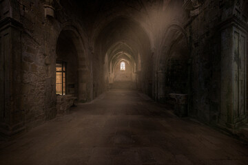 Interior of the monastery of Santa Maria de Rioseco, in Burgos, on a cold winter morning with a ray...