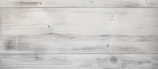 A close up of a rectangular white wooden table with a monochrome pattern