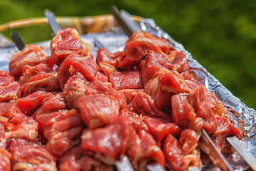 Marinated shashlik cooking on a charcoal grill. Shashlik or Shish Kebab popular in Eastern Europe. Shashlyk was originally made from lamb.