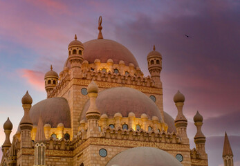 Sunrise graces the Ornate Mosque with its Domes in Sharm el Sheikh, Egypt.