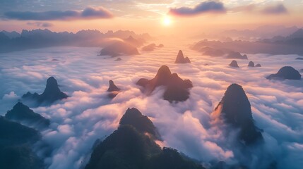Sunrise over the clouds with karst formation mountains in Guilin - obrazy, fototapety, plakaty