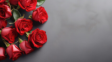 Red roses mock up banner on gray desktop background, top view