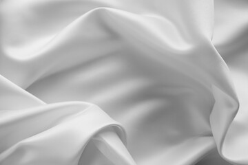 Close-up of rippled white silk fabric