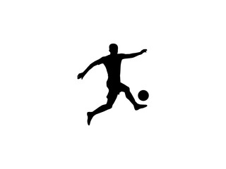 Fototapeta na wymiar Soccer player silhouette. Soccer player kicking ball.