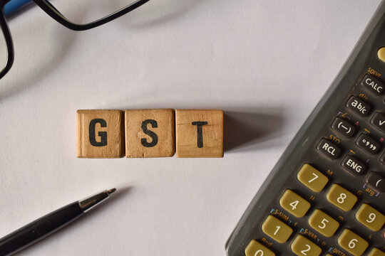 A closeup selective focus picture of a letters of GST