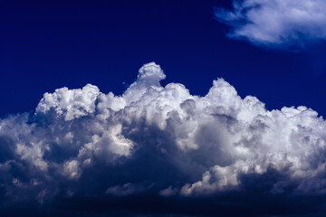 Naklejka na ściany i meble Beautiful cumulonimbus clouds with blue sky background.