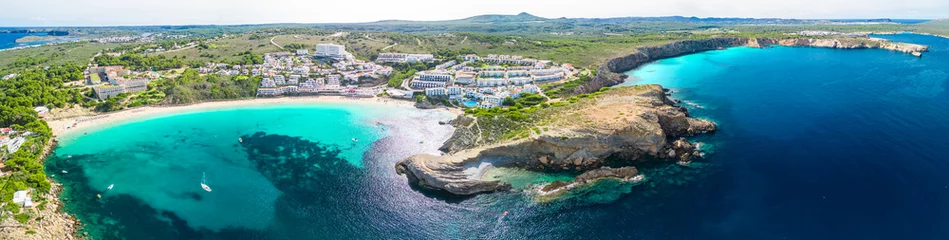 Rolgordijnen Areal drone view of the Arenal d'en Castell beach on Menorca island, Spain © Martin Valigursky