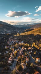 The sun sets over a serene mountain village, casting a serene glow across the houses and trees, nestled within a vast landscape of rolling hills and clear skies.