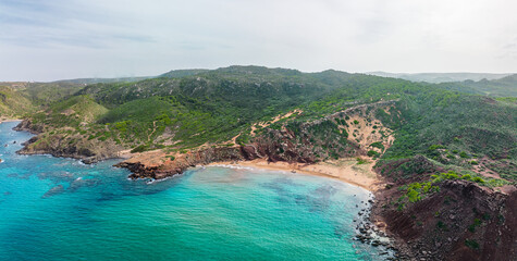 Aerial drone view of Cala del Pilar beach scenery of Menorca, near Ferreries - 772467063