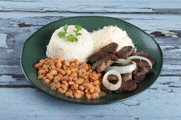 Brazilian food dish with beans, rice and meat - 772470454