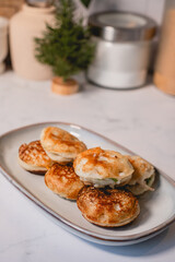 Traditional Thai dessert , ka nom krok, made with coconut milk and flour . Sweet and creamy taste.