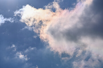 Clouds in the sunlight with a blue sky