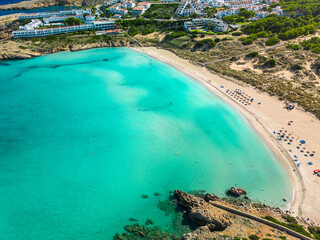 Areal drone view of Arenal de Son Saura beach at Menorca island, Spain