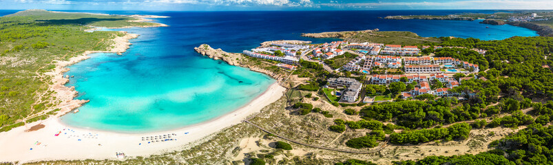Areal drone view of Arenal de Son Saura beach at Menorca island, Spain - 772478616