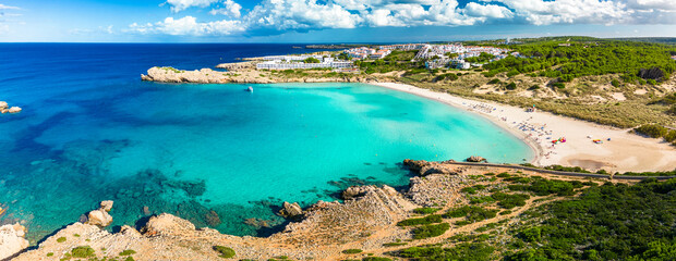Areal drone view of Arenal de Son Saura beach at Menorca island, Spain - obrazy, fototapety, plakaty