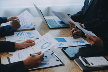 Meeting to present the Finance Executive business team. Discuss meetings to plan work, investment projects, analysis strategies, and discuss financial graphs and company budgets in the office. - obrazy, fototapety, plakaty