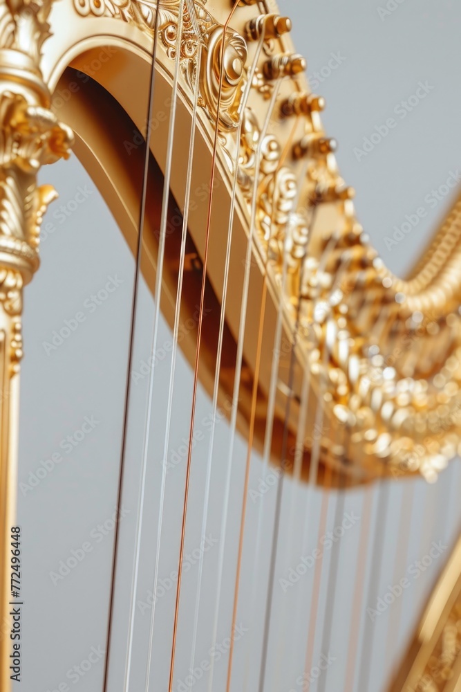 Aufkleber detailed view of a golden harp with strings. suitable for music themes